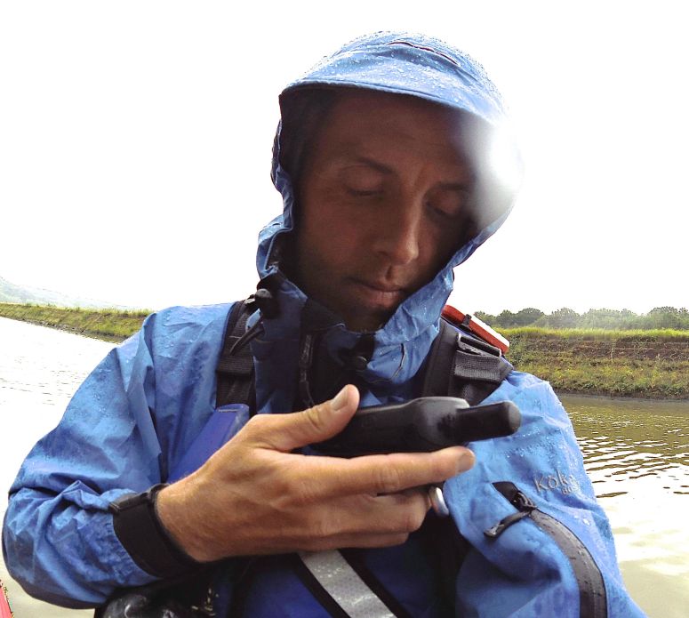 Integral wide-billed storm hood with bungee adjustments on sides and back